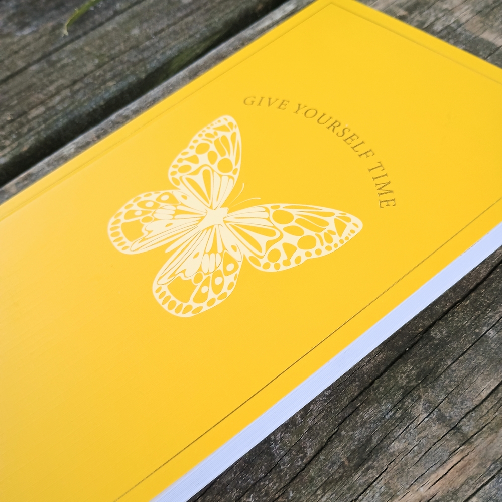 Elegant Yellow Journal with Butterfly Design
